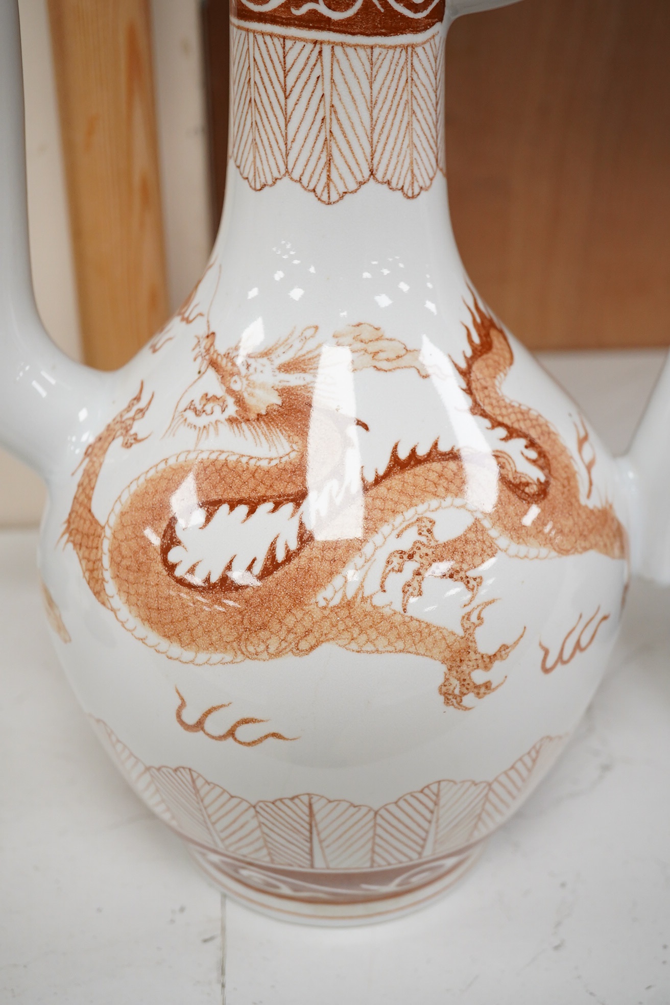 A large Chinese porcelain dragon ewer and cover, 43cm high. Condition - good